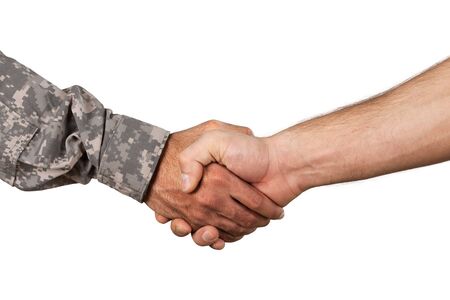 Soldier and Man Shaking Handsの写真素材