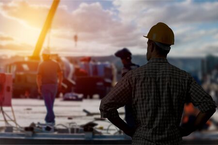 Silhouette of engineer and construction team working
