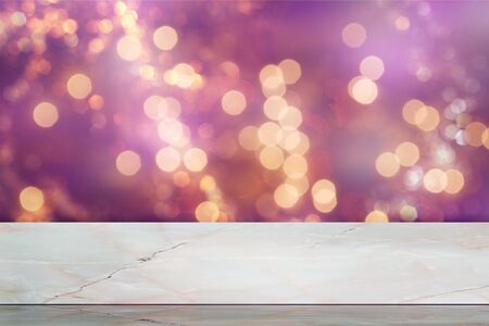 Empty white stone marble table top and blurred abstract bokeh light banner background - can used for...