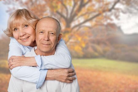 Portrait of happy senior couple smiling