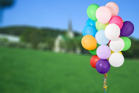 Bunch of colorful balloons on white backgroundの写真素材