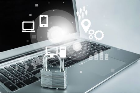 Lock on the laptop  background,Cyber safety concept