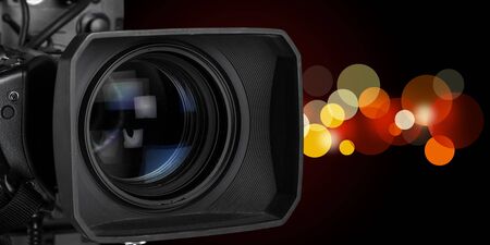 Professional video camera on dark background