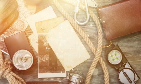 Traveler stuff on wooden table, vintage backgroundの写真素材