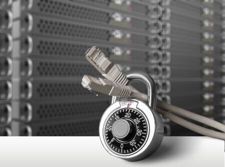 Lock and network cable on background.