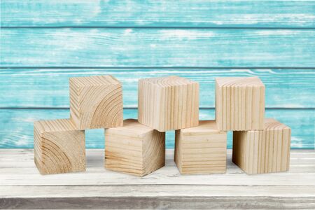 Wooden Toy Building wooden blocks on wooden deskの写真素材