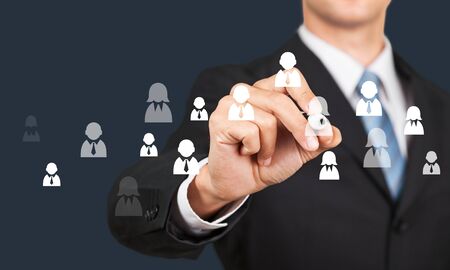 Businessman and internet and virtual reality concept - businessman pressing button on virtual screensの写真素材