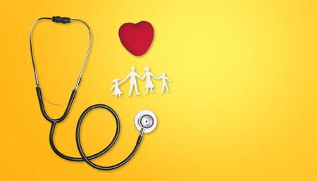Above shot of a stethoscope puts on the left side of a table on a yellow background.