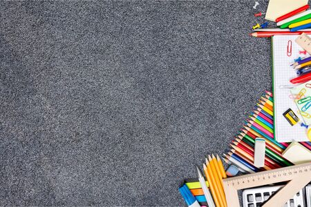 Assortment  of School supplies on  background