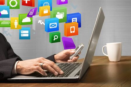 colorful application icons with Hand holding the