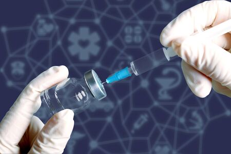 Human Hand with injection Syringe
