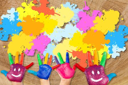 Children painting artwork  concept. kids hands with colors and smiles