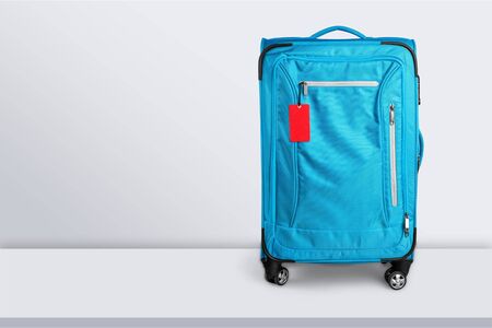 Big travel suitcase on backgroundの写真素材