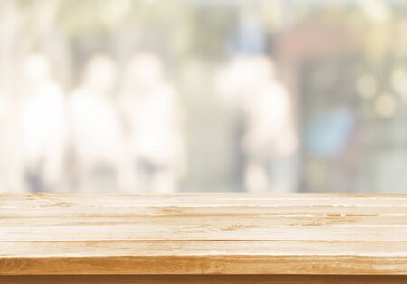 Wood table and blur with bokeh backgroundの写真素材