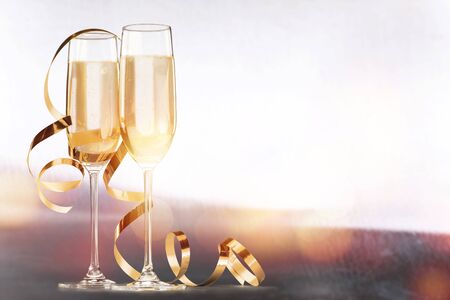 Two glasses of champagne isolated on white backgroundの写真素材