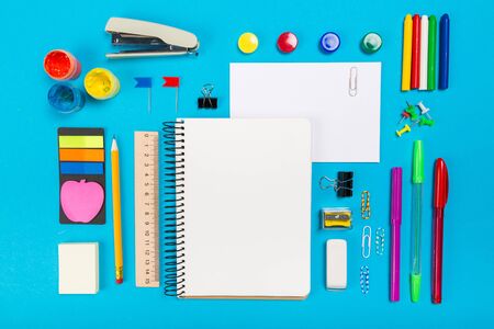 School office supplies on blue backgroundの写真素材