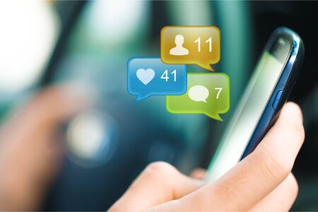 Girl using mobile smart phoneの写真素材