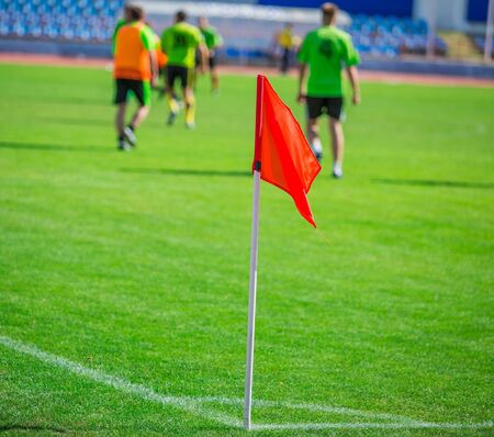 Football Corner Flag With Football Players In Backgroundの写真素材