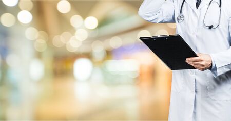 Close-up Doctor at hospital working with tabletの写真素材