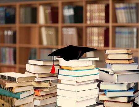 Old books on wooden tableの写真素材