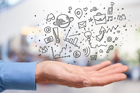 Business woman with signs on blurの写真素材