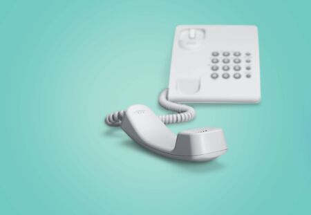 White telephone on greenの写真素材