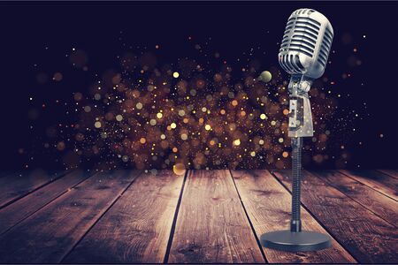 Retro style microphone on  backgroundの写真素材
