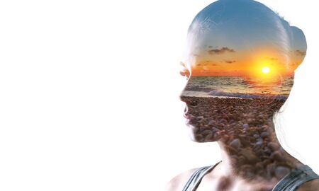 Psychoanalysis and meditation, concept. Profile of a young woman and sunset over the ocean, calm and mental health. Image with double exposure effect. The subconscious and how the brain works.
    
    - Image