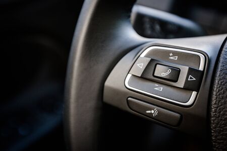 Mobile phone controls in a car