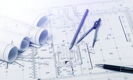 The part of architectural project and pencil, pen with divider on table