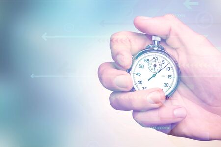 Stopwatch in Human Hand