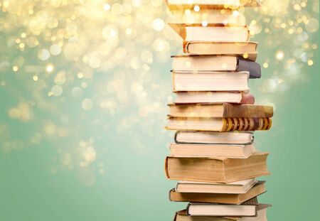 Stack of colorful books on  backgroundの写真素材