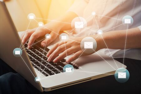 Business woman hand using Laptop pc
