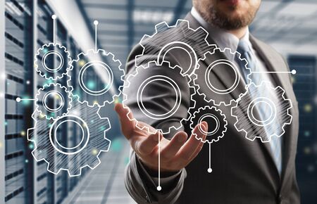 Heap of digital gears on blurred background