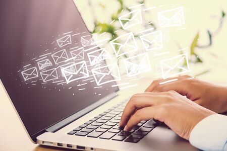 Businessman using laptop and mail illustration