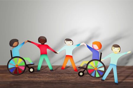 Disable paper figures concept on backgroundの写真素材