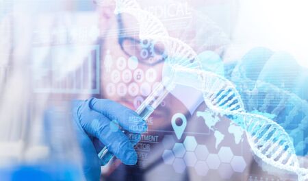 Scientist hand holding a Test tubesの写真素材