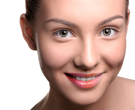 Close up head shot of beautiful young woman with colorful lips makeup on isolated white looking at the cameraの写真素材