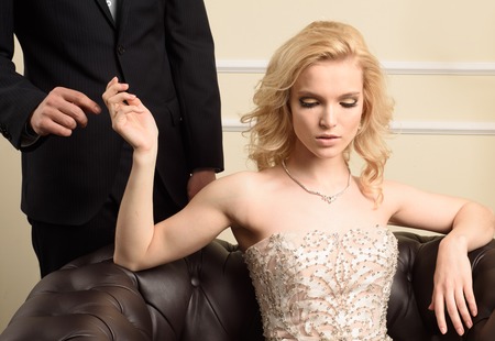 Luxury couple in rich interior. Cropped shotの写真素材