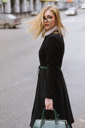 Portrait of beautiful blond woman in coat.の写真素材