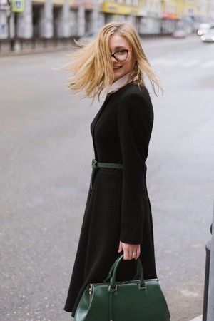 Portrait of beautiful blond woman in coat.の写真素材