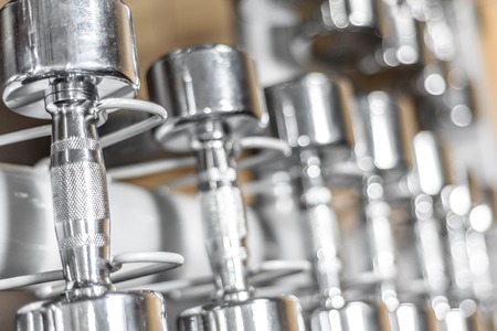 Dumbbells on a stand in the gym.の写真素材