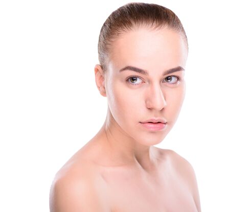 Beauty of health young woman looking at the side. Isolate on white backgroundの写真素材