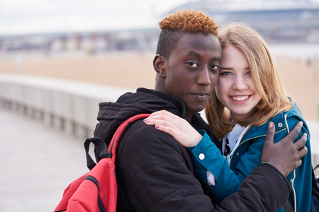 Portrait Of Loving Young International Couple. African Guy and Caucasian Woman.の写真素材
