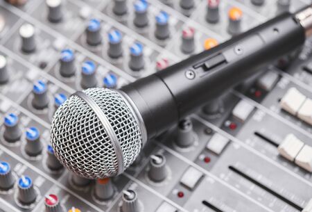 Microphone on sound mixing console. Close up shotの写真素材