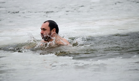 Bathing in the river in winter, in the holeのeditorial素材