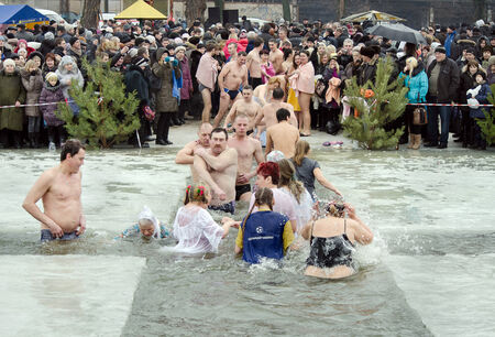 People bathe in the river in winter    Christian religious festival Epiphany のeditorial素材