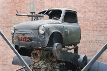 Zaporozhets  car upa   with a machine gun in a cafe Kryivka Lviv. Ukraineのeditorial素材