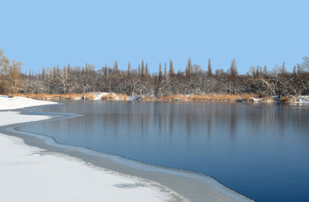 Water winter landscape. The ice edge in the freezing river Samara (a tributary of the Dnieper River).の写真素材