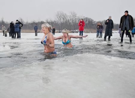 Healthy lifestyle. Courage, courage, activity. Swimming in the ice-hole on Epiphanyのeditorial素材